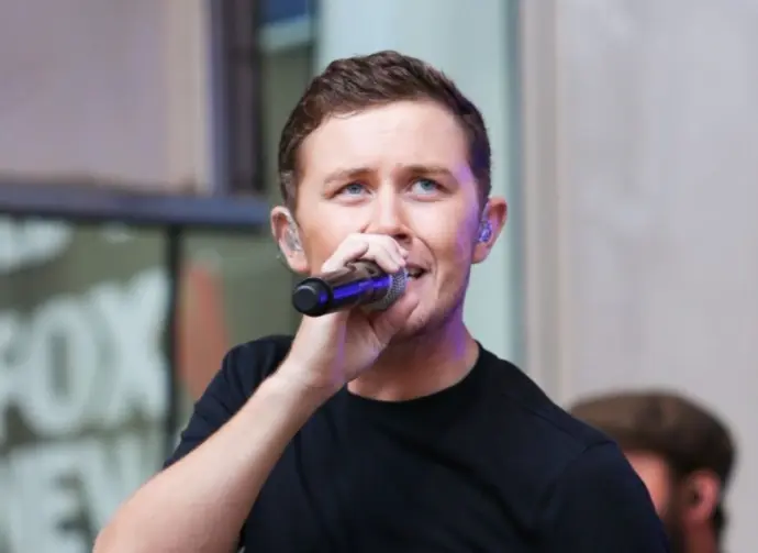 Scotty McCreery performs onstage at Fox and Friends' All-American Summer Concert Series at 48th Street and 6th Avenue on July 31^ 2015 in New York City.