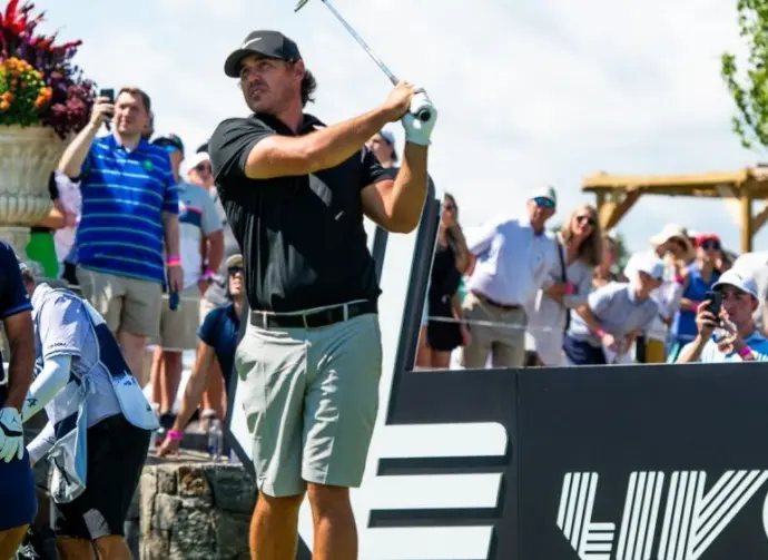 Brooks Koepka watches his shot during the LIV Golf Tournament held at the Trump National Golf Club in Bedminster^NJ. BEDMINSTER^NJ-AUGUST13^ 2023