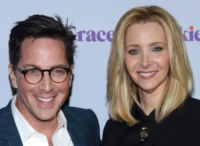 Dan Bucatinsky and Lisa Kudrow arrives for the "Grace and Frankie" Season 4 Premiere on January 18^ 2018 in Palm Springs^ CA