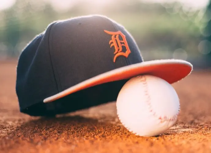 Baseball ball with Detroit Tigers cap on pitchers mound. BELGRADE^ SERBIA - APRIL 12^ 2017