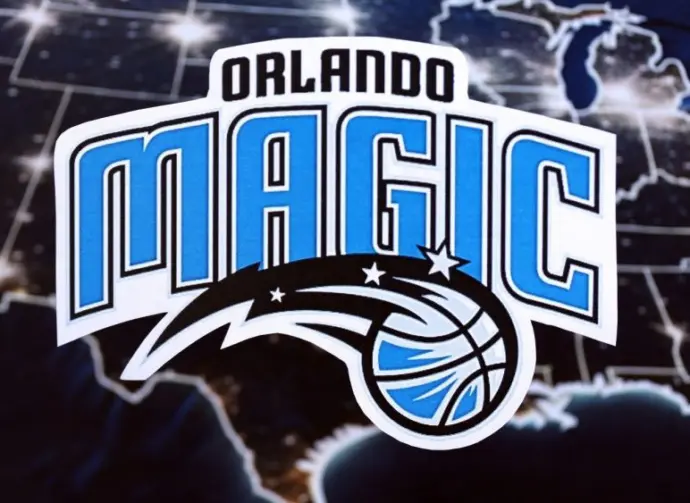 Orlando Magic basketball team badge lies on United States map background banner