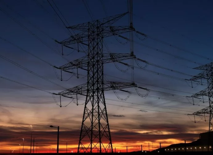 Overhead power lines at sunset in Spain