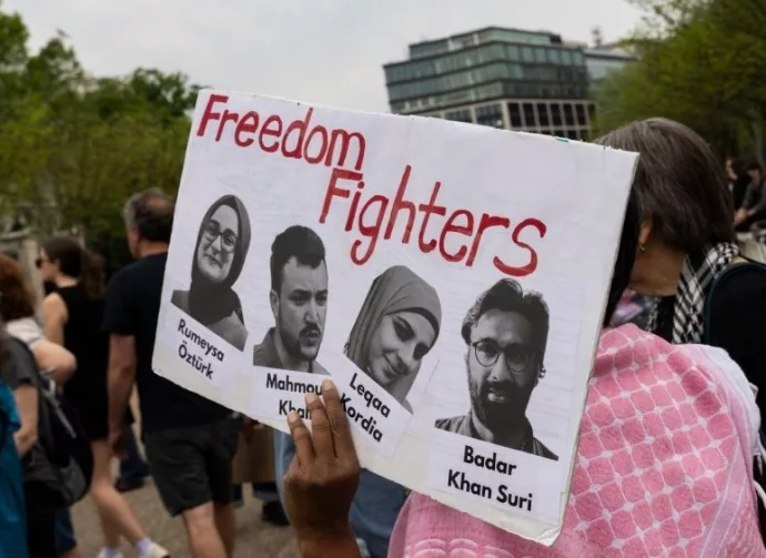 Demonstrators gather during a protest in front of the White House in Washington^ DC^ on April 19^ 2025.