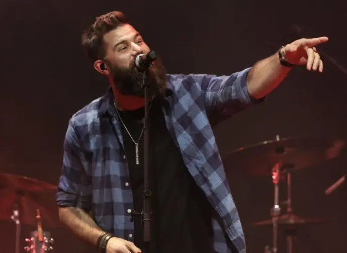 Jordan Davis performs at CMT's RAMJAM on June 3^ 2019 at TopGolf in Nashville^ Tennessee.