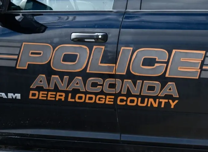 Sign on Anaconda Deer Lodge County police car in closeup. Anaconda^ MT^ USA - May 6^ 2025