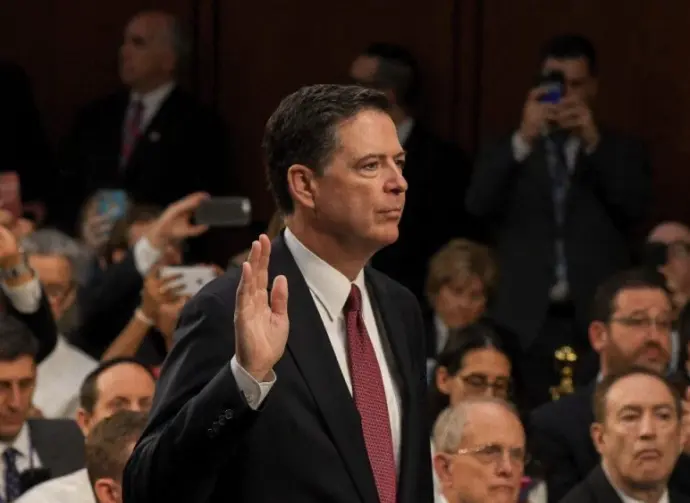 Former FBI Director James Comey testifies in front of the Senate Intelligence Committee during hearing in the Hart Senate Office building June 8^ 2017^ in Washington DC.