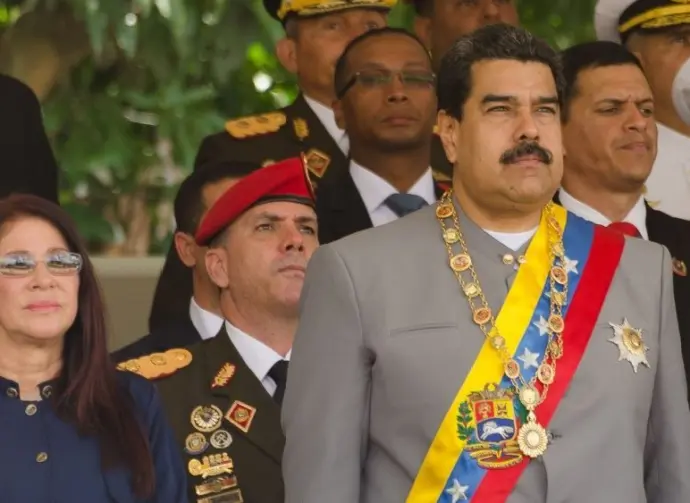President of Venezuela^ Nicolás Maduro with First Lady Cilia Flores in a military parade. Caracas. February 1^ 2017