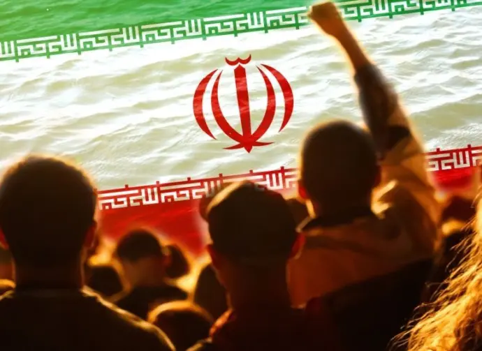 Defocus protest in Iran. Conflict war over border. World crisis. Country flag. Woman low rights. Male hands. Out of focus.