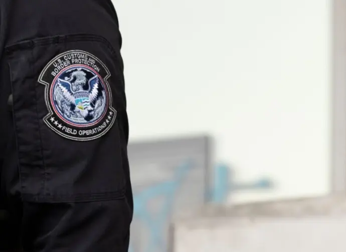 U.S. Customs and Border Protection (CBP) field officers guard a federal building during ICE deportation protests in Downtown LA. Los Angeles^ California^ USA - June 10^ 2025