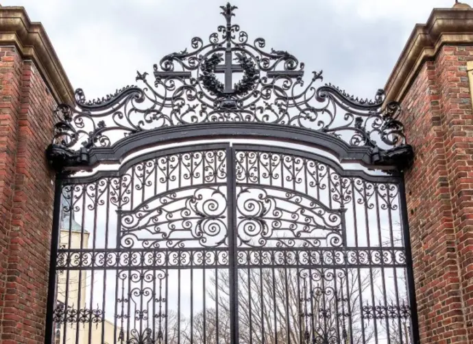 The iron gates of Harvard in Cambridge^ MA^ USA.