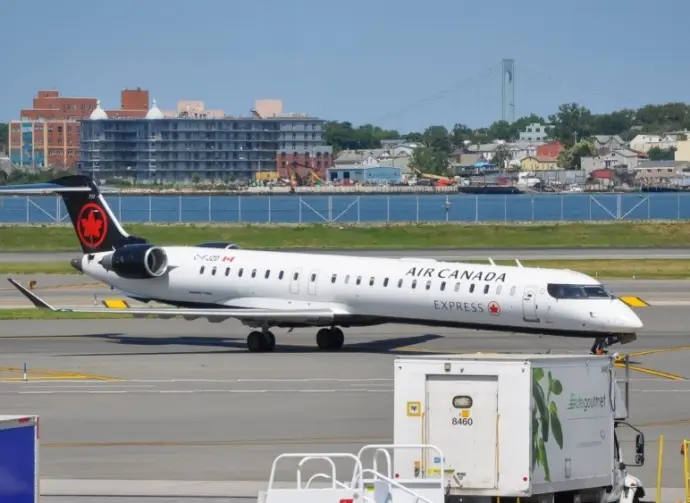 Air Canada Express plane seen at the tarmac of LaGuardia International Airport. LaGuardia Airport^ New York^ USA - August 8^ 2025
