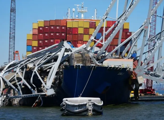 Container vessel Dali is trapped and aground under the wreckage of the Francis Scott Key Bridge in Baltimore. Baltimore^ MD USA - 4-23-2024