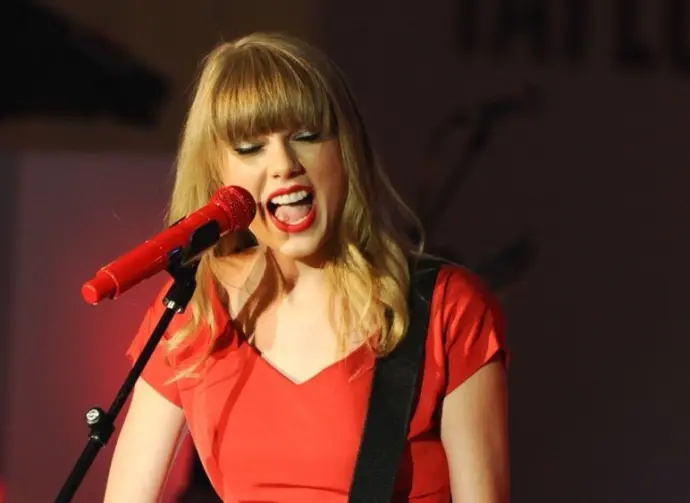 Taylor Swift performs and turns on the Christmas Lights at Westfield Shepherd's Bush^ London. 06/11/2012