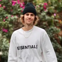 Justin Bieber enjoys a walk around his neighborhood. Los Angeles^ CA USA 02 27 2021
