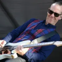 Guitarist Tom Dumont performs with his band No Doubt at the New Orleans Jazz and Heritage Festival New Orleans^ LA - May 1^ 2015