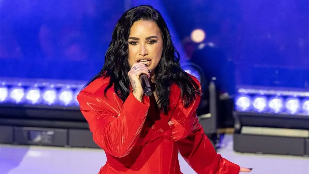 Demi Lovato performs on stage during American Heart Association Go Red for Women and Red Dress Collection Concert at Jazz at Lincoln Center in New York on Jan 31^ 2024.