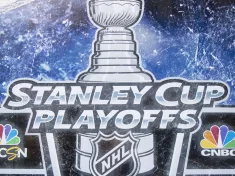 Stanley Cup Playoffs logo displayed at the NBC Experience Store window in midtown Manhattan