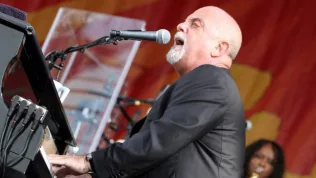 Billy Joel performs on state at the 2013 New Orleans Jazz and Heritage Festival. New Orleans^ Louisiana - April 27^ 2013