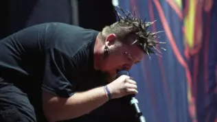 Vocalist Dave Williams of the Heavy Metal band Drowning Pool performs in concert June 6^ 2001 at Mile High Stadium in Denver^ CO.