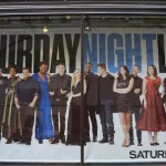 NBC Experience Store window display decorated with Saturday Night Life logo in Rockefeller Center in Midtown Manhattan. NEW YORK - NOVEMBER 16^ 2017