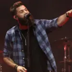 Jordan Davis performs at CMT's RAMJAM on June 3^ 2019 at TopGolf in Nashville^ Tennessee. NASHVILLE^ TN - JUN 3: