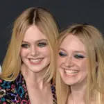 Elle Fanning & Dakota Fanning arriving at the Saint Laurent at the Palladium fashion show at the Hollywood Palladium. LOS ANGELES^ CA - FEBRUARY 10^ 2016