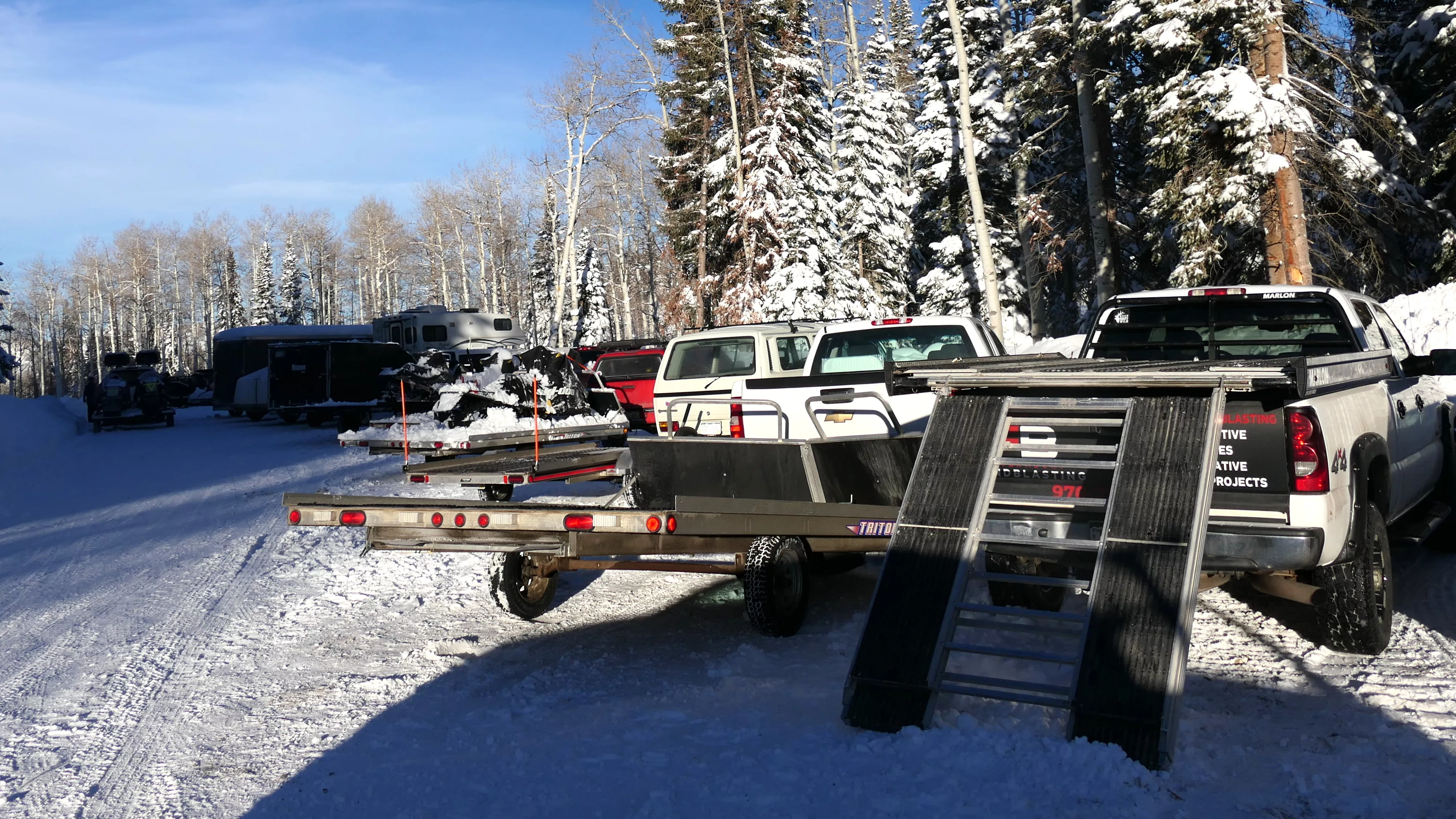 buffalo-pass-winter-snowmobile-parking-slider