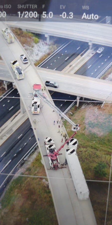 semi-hanging-over-flyover-ramp