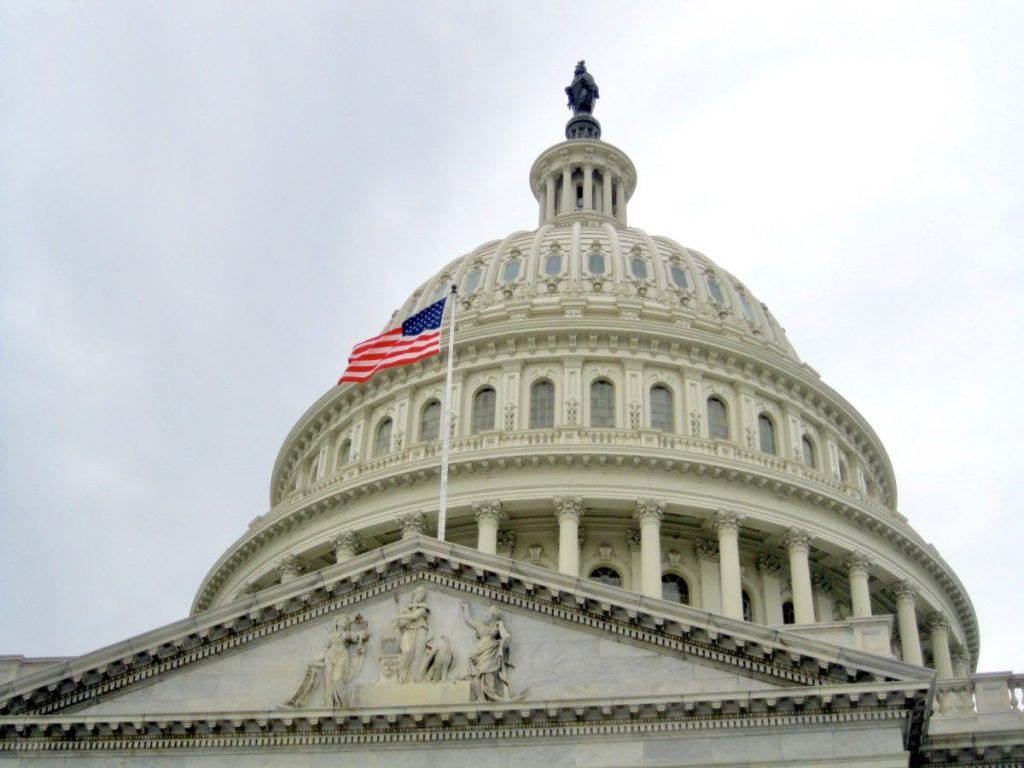 view-of-the-capitol-building-dome-with-the-united-states-flag-in-washington-d-c-during-usa-travel-1024x768-1