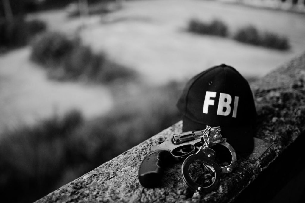 fbi-cap-with-revolver-and-handcuff-1024x682-1