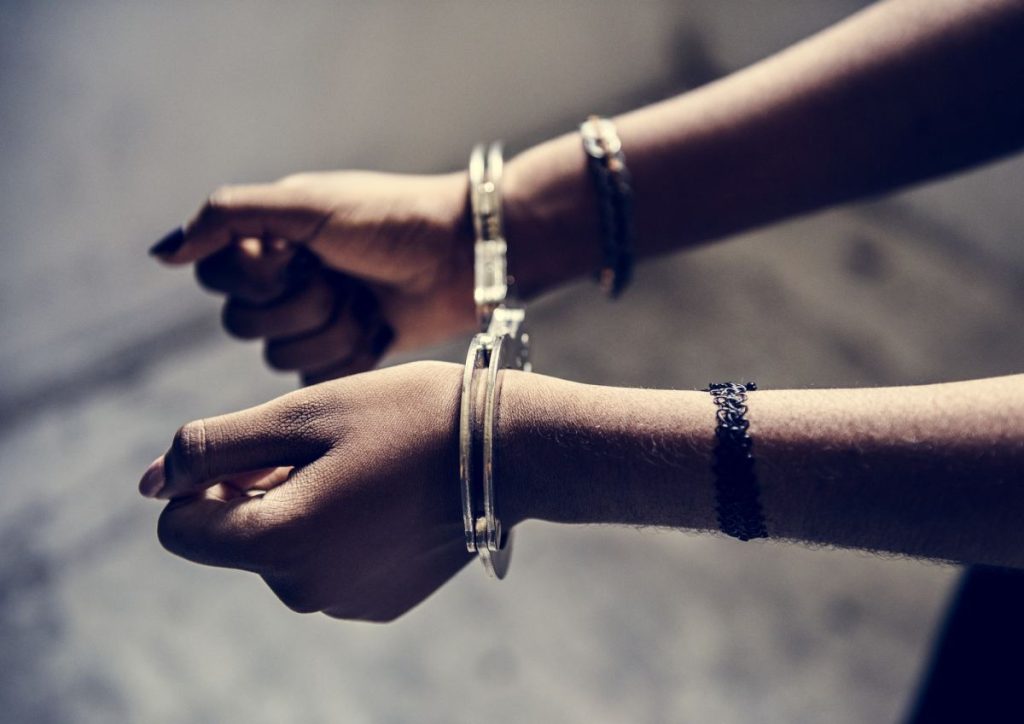 closeup-of-arrested-hands-with-handcuffs-1024x724934426-1