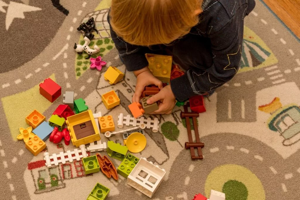 toddler-boy-playing-with-construction-blocks-early-development-childcare-preschool-1024x683297409-1