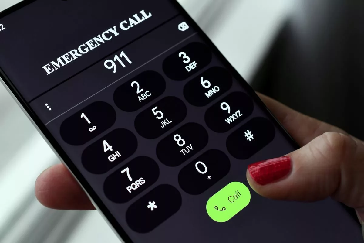 dialing-911-emergency-services-call-on-mobile-cell-phone-police-fire-department-rescue-emt674234