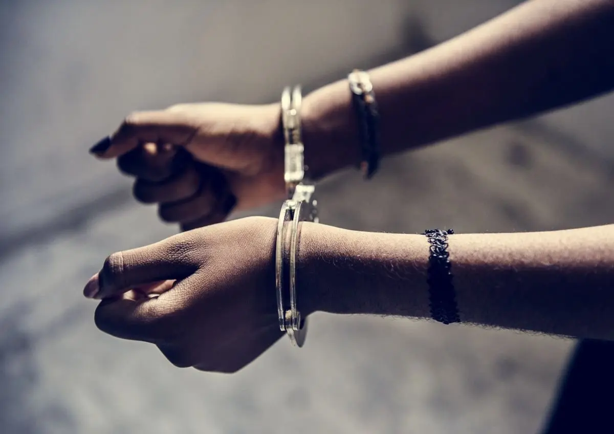closeup-of-arrested-hands-with-handcuffs190378