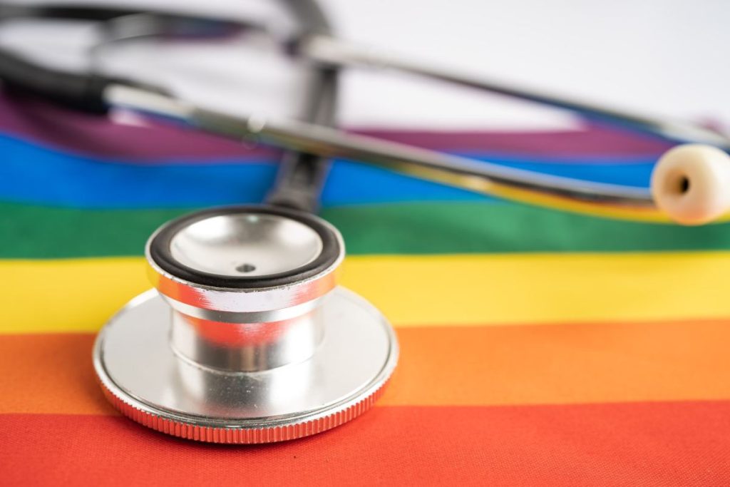 black-stethoscope-on-rainbow-flag-background-symbol-of-lgbt-pride-month-celebrate-annual-in-june-1024x683-1219698