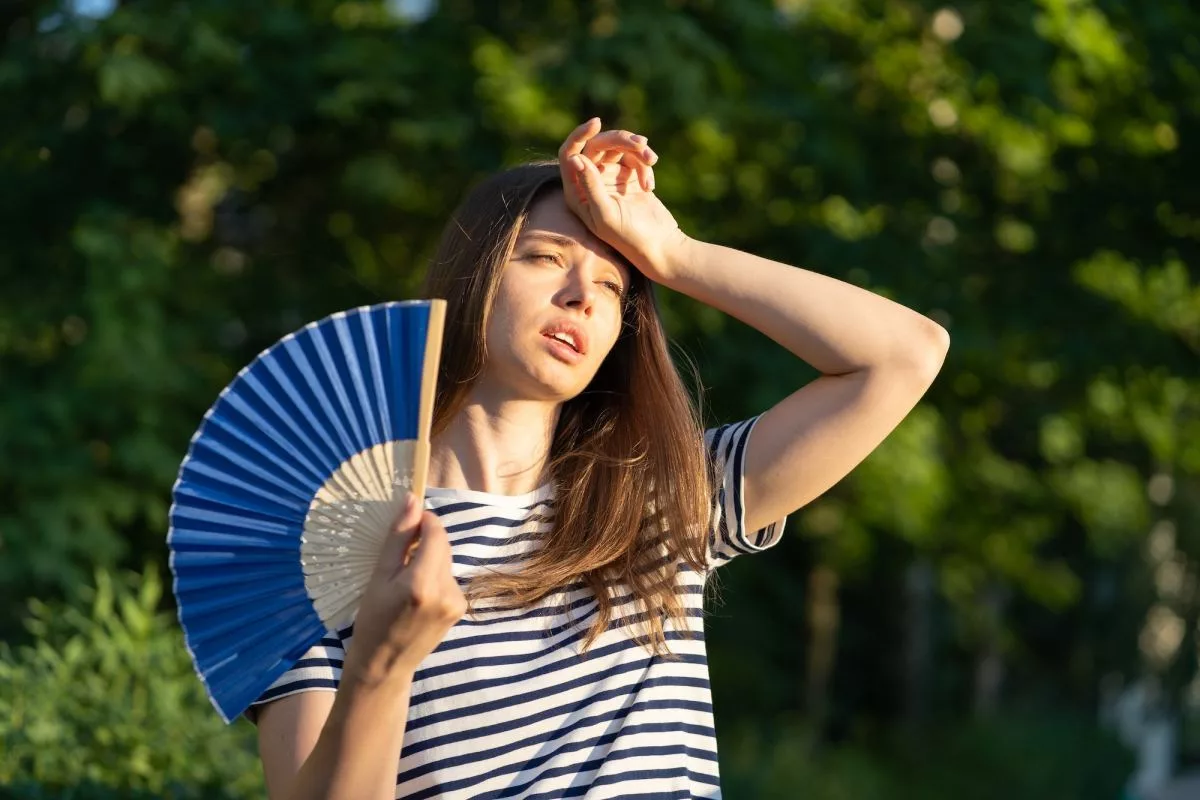 young-woman-suffer-heatstroke-outdoors-unhappy-girl-feel-bad-of-hot-temperature-touch-forehead483369