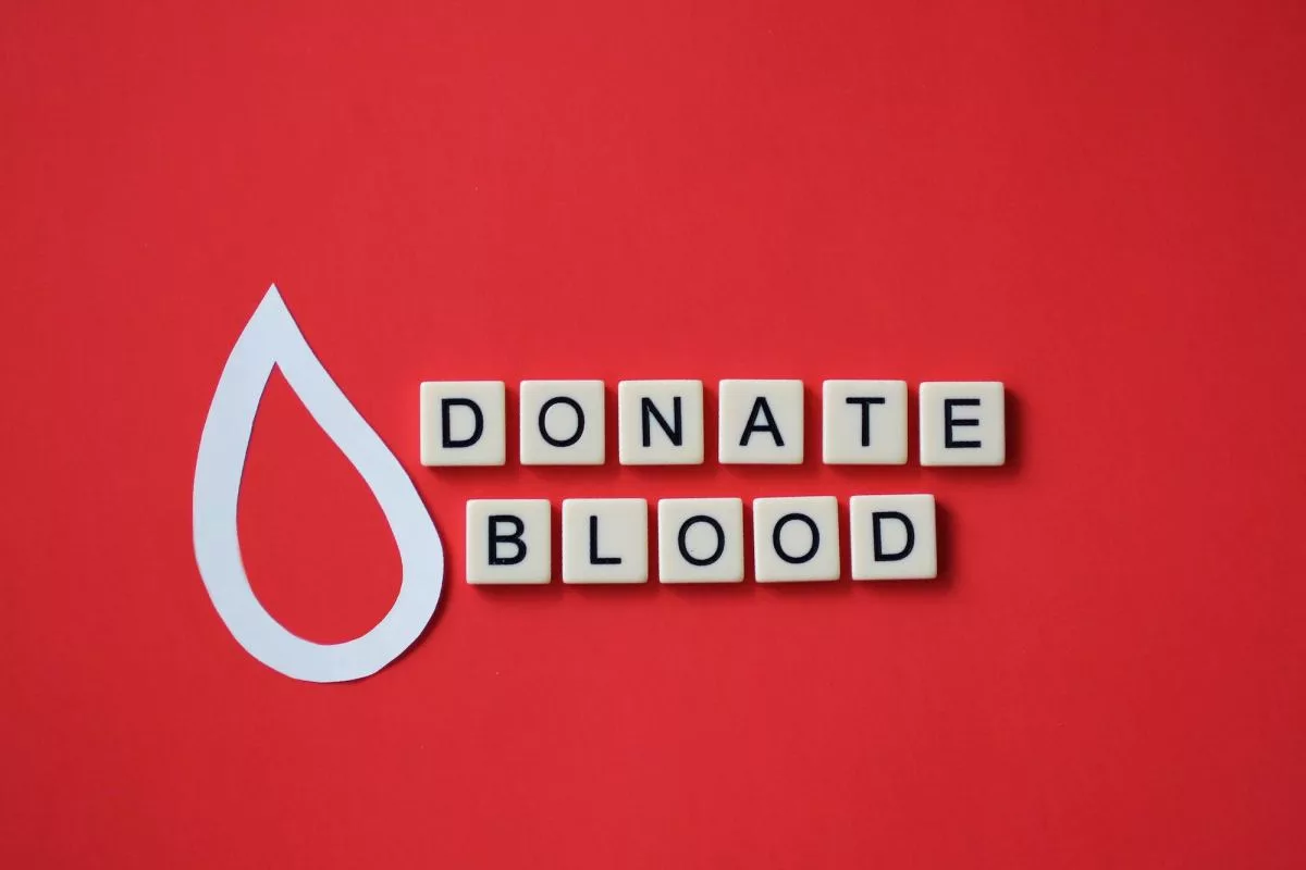 overhead-of-tiles-with-donate-blood-phrase-spelled-on-red-background-283374