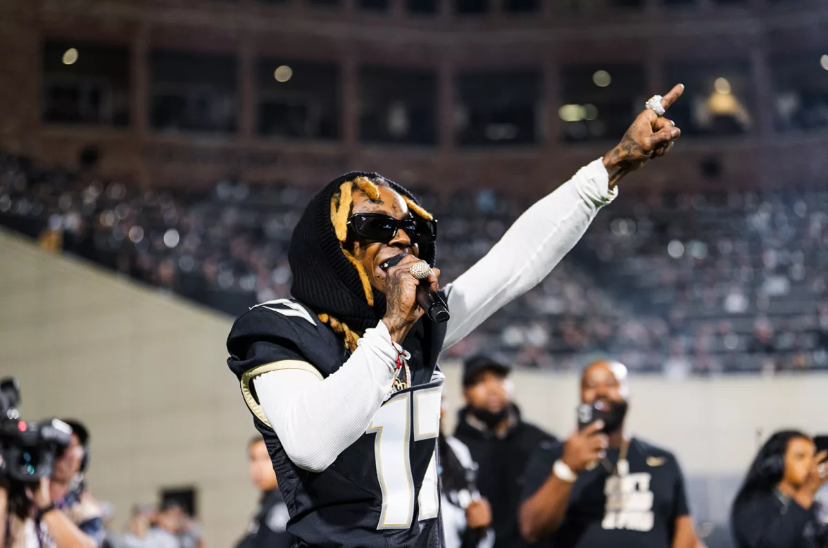 lil-wayne-press-cr-derek-marckel-cu-athletics-2023-billboard-1548426939