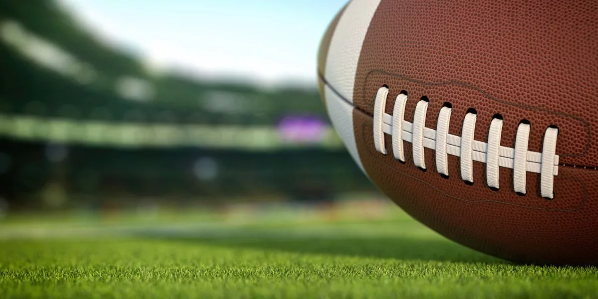 american-football-ball-on-grass-of-football-arena351746