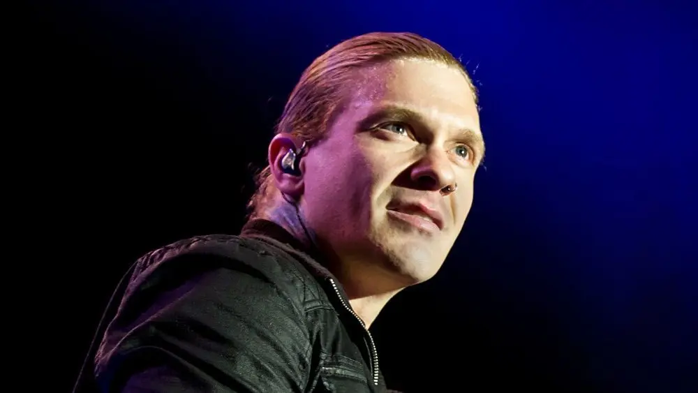 Brent Smith of Shinedown against a black and blue background at Rockstar Uproar Festival on September 25 2012 in Nampa^ Idaho.
