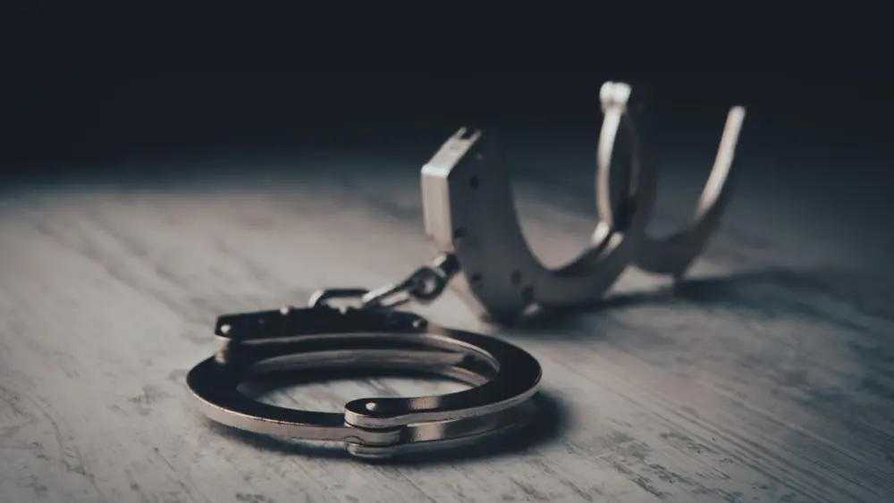 handcuffsgettyimages-1386720610-e1681745901621401836