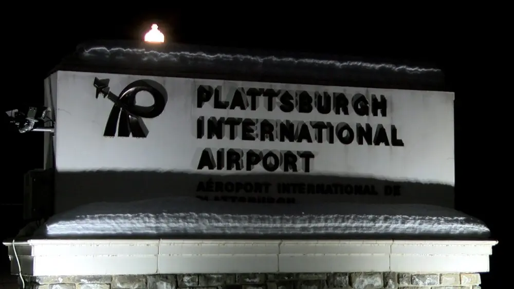 plattsburgh-international-airport-sign-winter-night671416