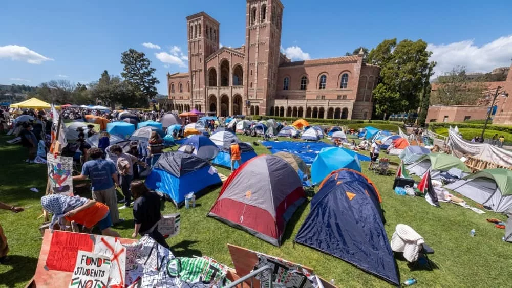 Pro-Palestinian protesters gathered at an encampment at the University of California^ Los Angeles (UCLA)^ on Friday^ April 26^ 2024^ in Los Angeles.