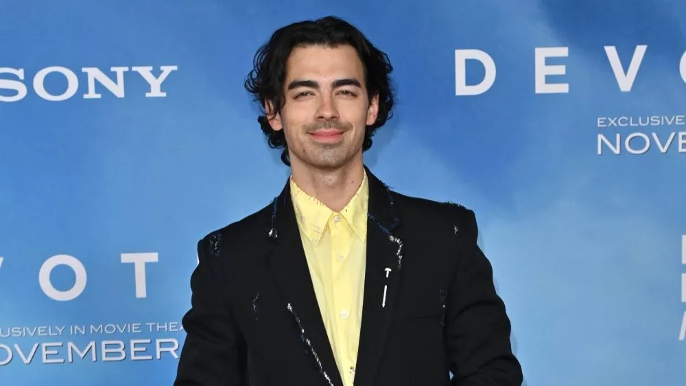 Joe Jonas at the premiere for "Devotion" at the Regency Village Theatre. LOS ANGELES^ CA. November 15^ 2022