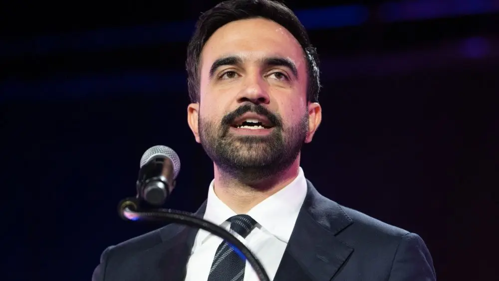 Mayoral candidate Zohran Mamdani speaks during 'New York is not for sale' rally at Forest Hill Stadium in New York on October 26^ 2025.