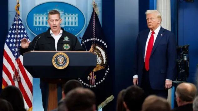 Sean Duffy^ Transportation Secretary^ speaks at a White House press briefing. Pres. Donald Trump also pictured
