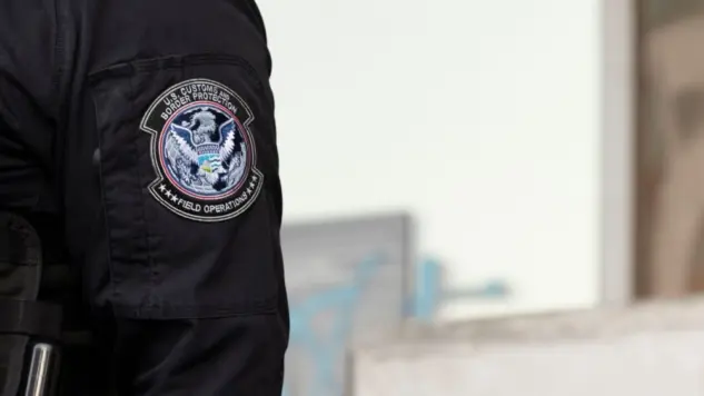 U.S. Customs and Border Protection (CBP) field officers guard a federal building during ICE deportation protests in Downtown LA. Los Angeles^ California^ USA - June 10^ 2025