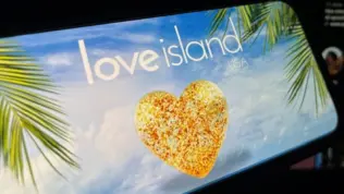 '2025 Love Island'' shown on a smart phone. is a reality dating show that originated in the UK. The premise involves a group of singles living together in a luxurious villa^ where they couple up Toronto^ Canada - June 5