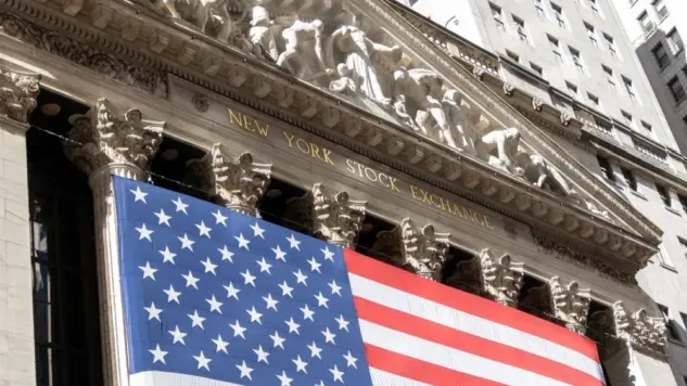 Grand American flag displayed on the facade of the New York Stock Exchange in downtown Manhattan. New York^ NY^ USA - 11.05.2024