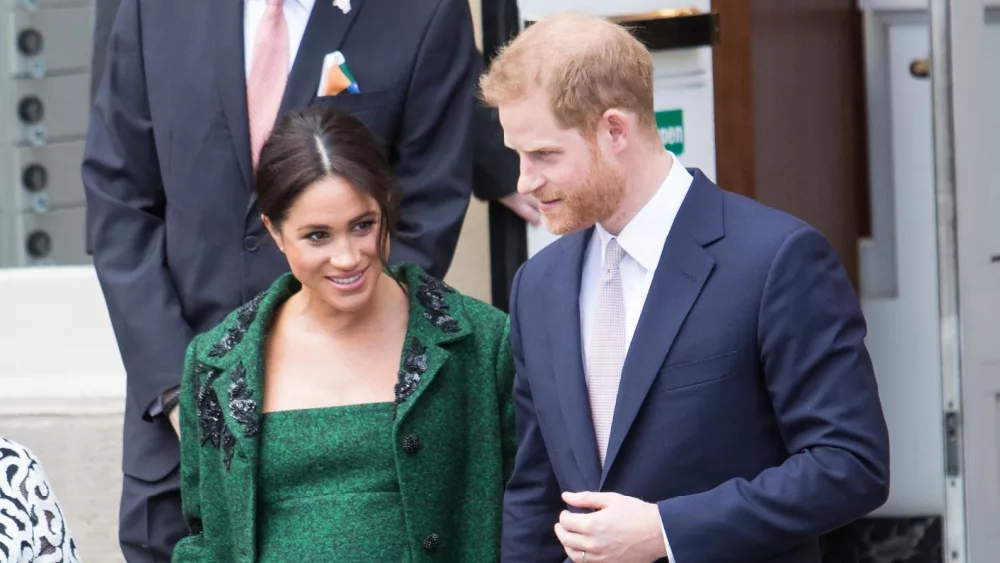 Meghan Markle and Prince Harry receive flowers after leaving Canada House on the March 11^ 2019 in London^ UK